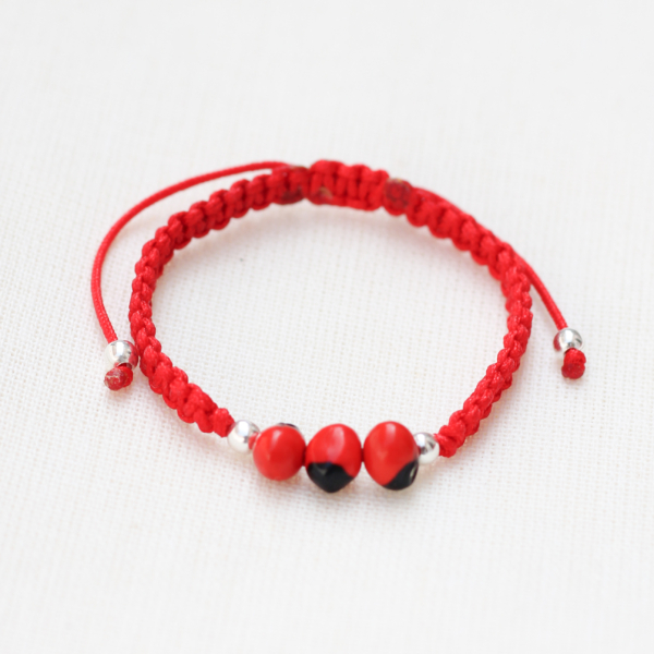 Pulsera hilo rojo bebé huayruro