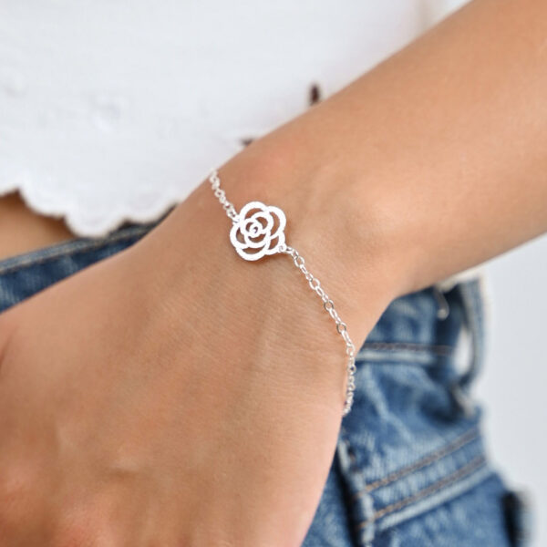 Pulsera flor rosa  1 plata